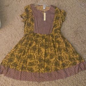 Cute patterns and color contrasts on this dress.